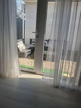 Апартаменты Коттеджный двор Бердянск Большой двухместный номер с 1 кроватью-16